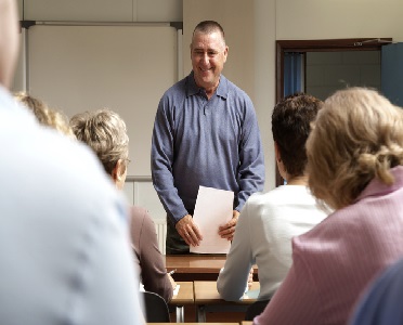 Adult man in classroom