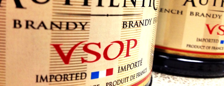 close-up of brandy label with bottle